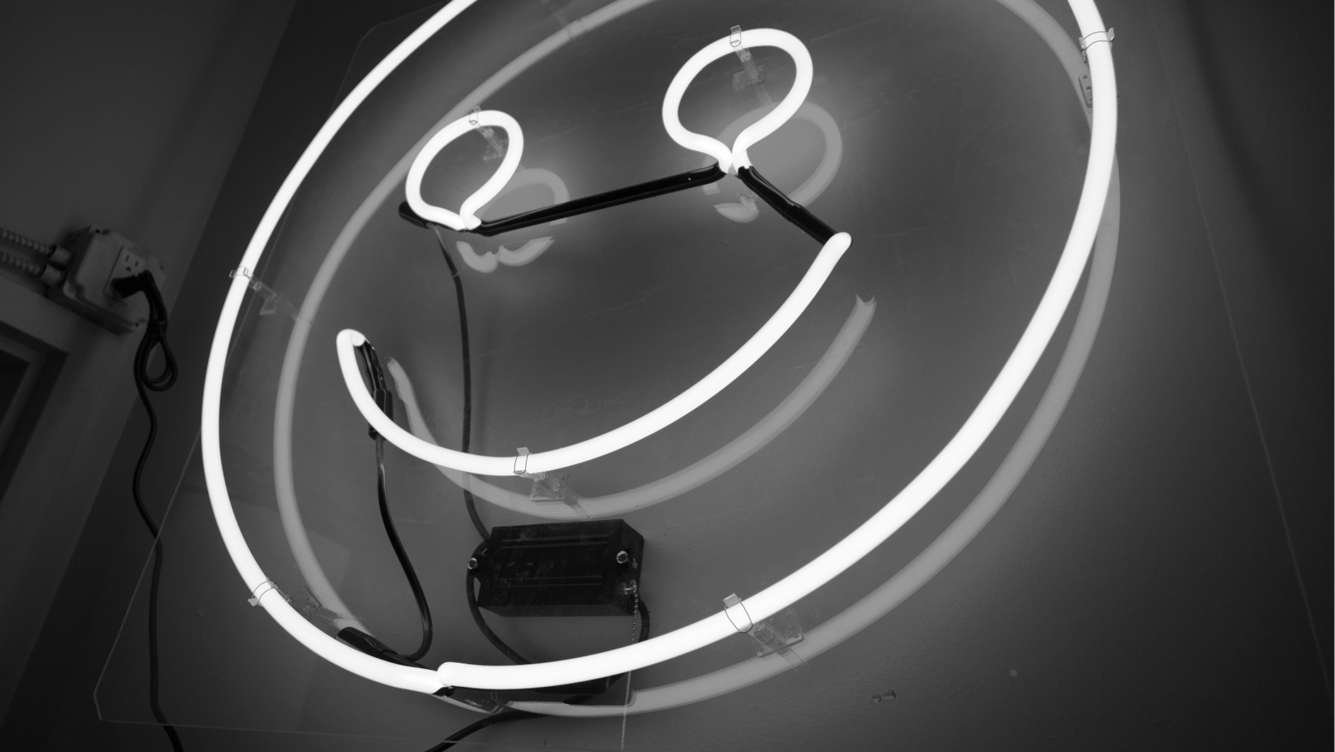 neon sign of smiley face